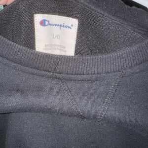 Black champion sweater.
